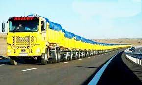 Australian road train in yellow colour