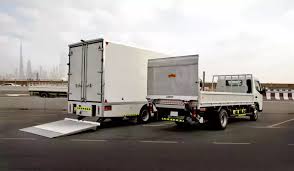 2 3 ton trucks in white colour 