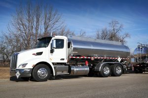 A tank truck, also known as a tanker truck or liquid transport truck, is a specialized vehicle designed for the transportation of liquids or gases in bulk quantities.